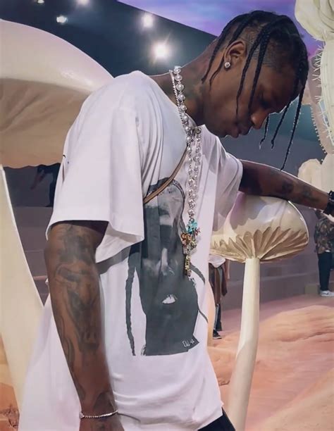 travis dior shirt